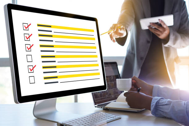 istock businessman SURVEY and Results Analysis Discovery Concept 1011052222