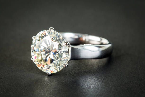 istock Jewelry ring on the black background 1011061292