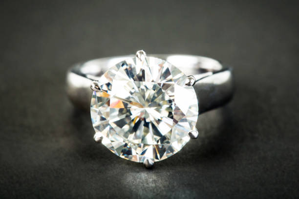 istock Jewelry ring on the black background 1011061350