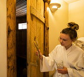 Girl entering a sauna