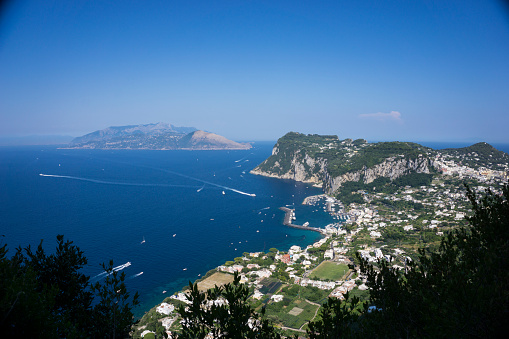 Capri is set in the blue waters of Italy's Tyrrhenian Sea in the Bay of Naples just off the Sorrentine Peninsula in the southern Italian region of Campania.