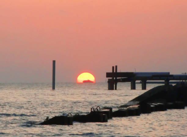 istock Sunset over summer sea with a small waves 1011082540