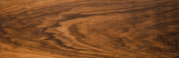 istock Walnut wood texture. Super long walnut planks texture background. 1011085570