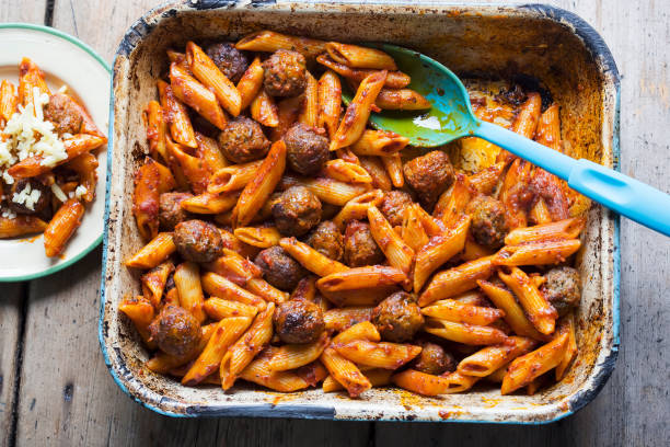 Meatballs & pasta bake with tomato sauce Meatballs & pasta bake with tomato sauce pasta casserole stock pictures, royalty-free photos & images