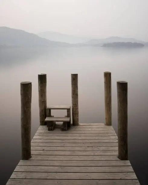 Derwentwater pier jetty mist fog sunset Lake District UK calm peaceful still relaxation mindfulness England