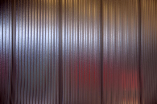 big partition wall with milky and blurry segments