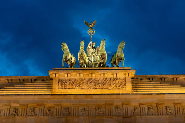 istock Brandenburg gate Berlin Germany at night 1011104542