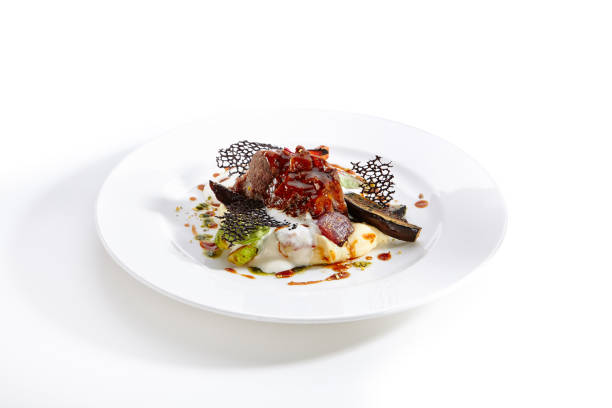 istock Delicacy cuisine served on round shaped plate 1011104770