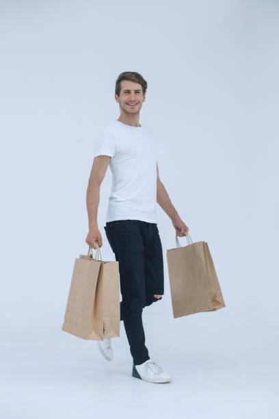 istock man carries out purchases isolated background 1011107340