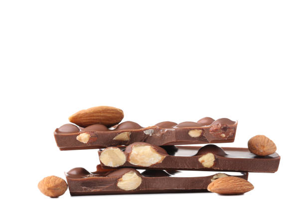 istock Chocolate pieces with almonds isolated on white background 1011112666
