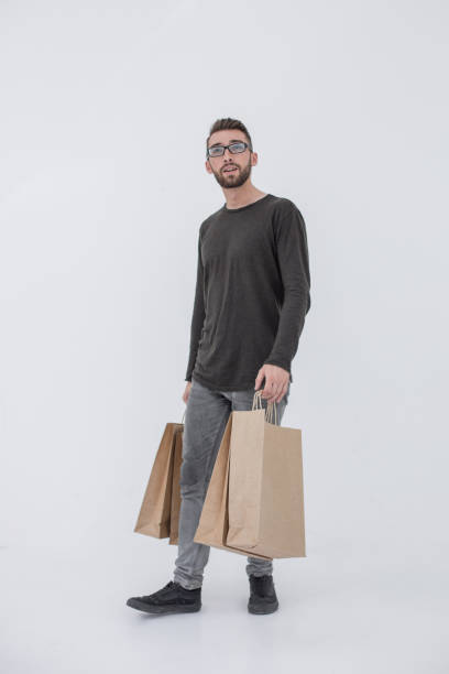 istock Handsome man with bag. Isolated over white background 1011112738