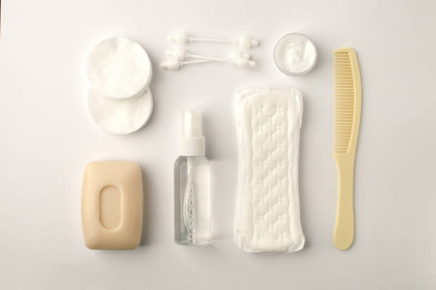 istock Different personal hygiene objects on white background, female boycare concept, monochrome, top view 1011113496