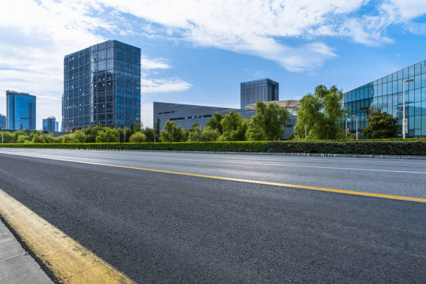 istock City empty road with modern buildings background 1011128258