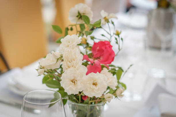 istock flowers on dinner table - flower decoration 1011141020