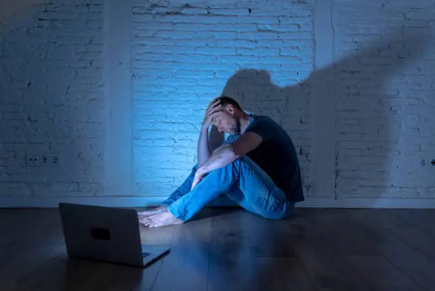 Photo of Men suffering Internet cyber bullying