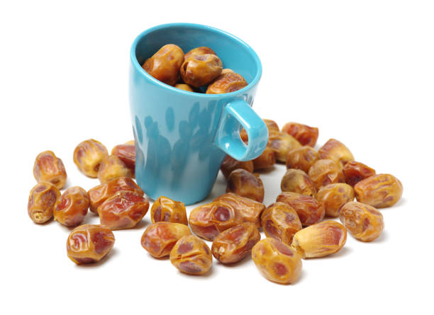 Some dried dates isolated on the white background