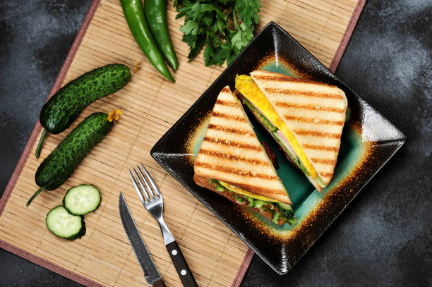 istock Top view of Sandwich toast with lettuce, ham, egg 1011172456