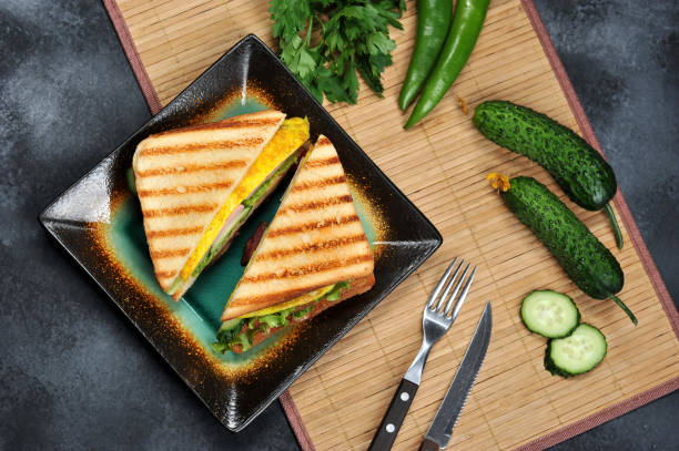 istock Top view of Sandwich toast with lettuce, ham, egg 1011173244