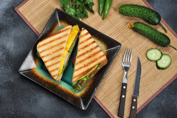 istock Top view of Sandwich toast with lettuce, ham, egg 1011173276