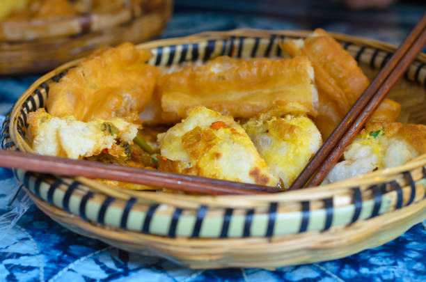 istock deep fried dough chines food in Lijiang Yunnan. 1011176600