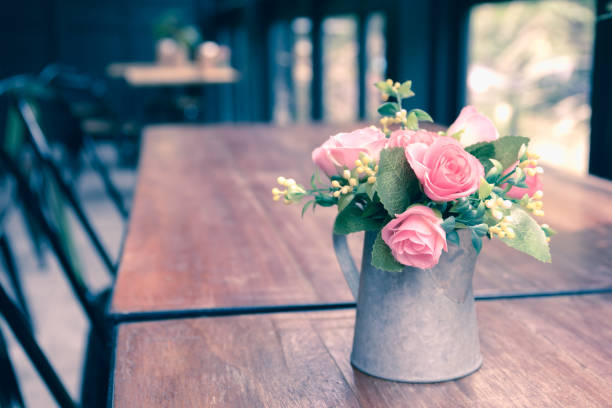 Vintage flowers, beautiful soft pink roses in vase. Vintage flowers, beautiful soft pink roses in vase. artificial flower stock pictures, royalty-free photos & images