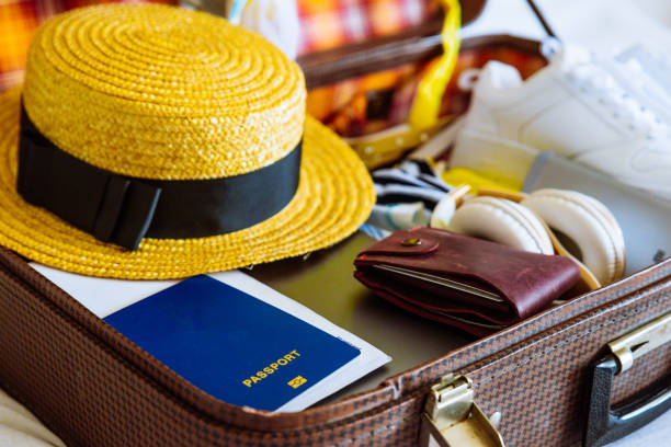 istock suitcase with clothes ready for trip. travel concept. copy space 1011182378