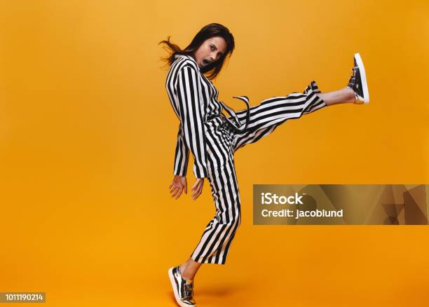 Funky Female On Orange Background Stock Photo - Download Image Now - Fashion, Fashion Model, Portrait