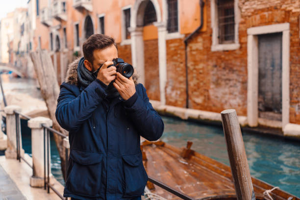 istock Tourist taking photos in Venice 1011194364