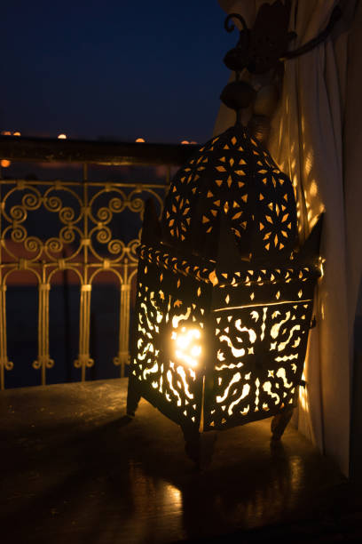 istock oriental lantern with candle in the night 1011194832