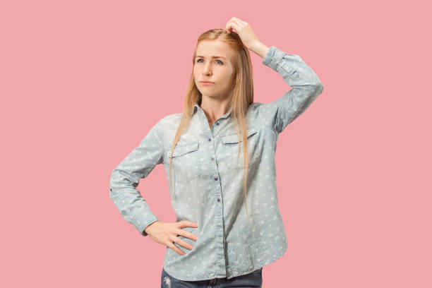 istock Young serious thoughtful business woman. Doubt concept 1011197572