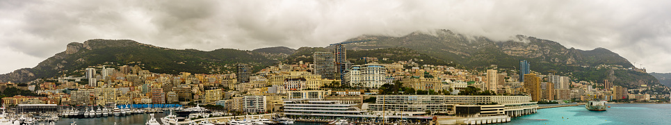 Harbour city of Monaco and Monte Carlo in the south of France.\nMonte Carlo panorama, shot from the sea.