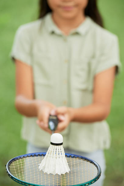 istock Unrecognizable girl with racquet and shuttlecock 1011210698