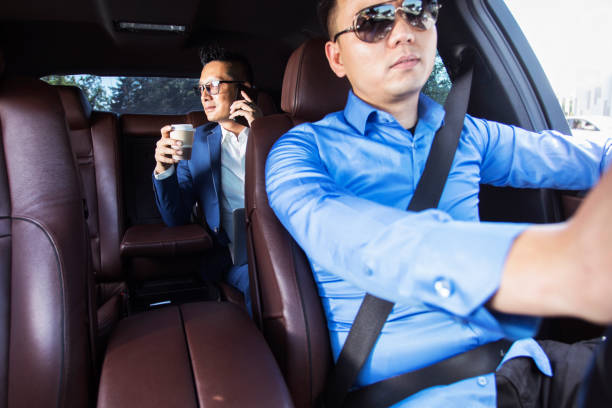 istock Chinese businessman at car 1011227984
