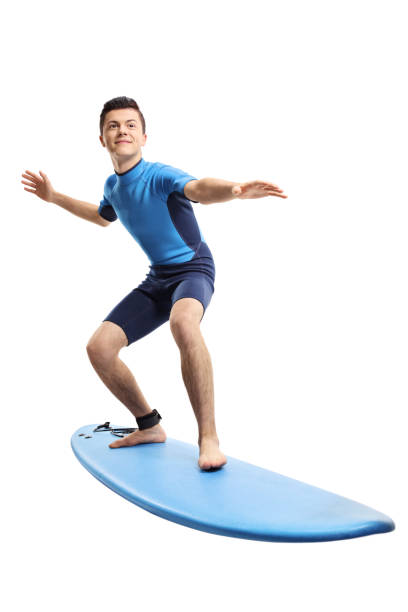 istock Teenage boy surfing 1011232238