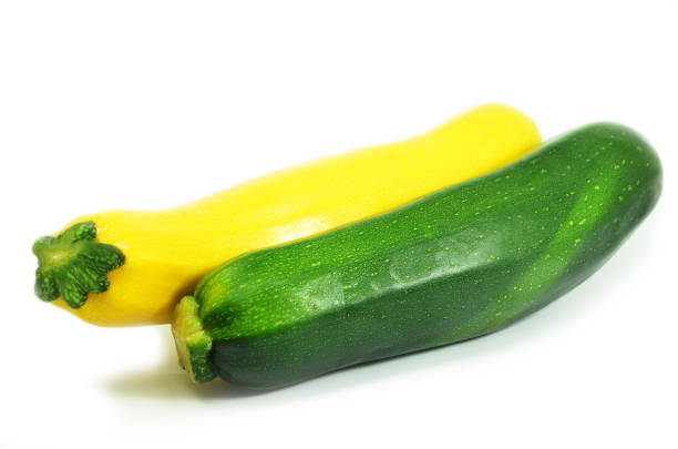 istock Yellow squash and  zucchini isolated 1011232350
