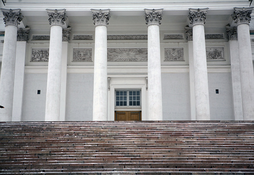 Columns with steps in a snowy weather