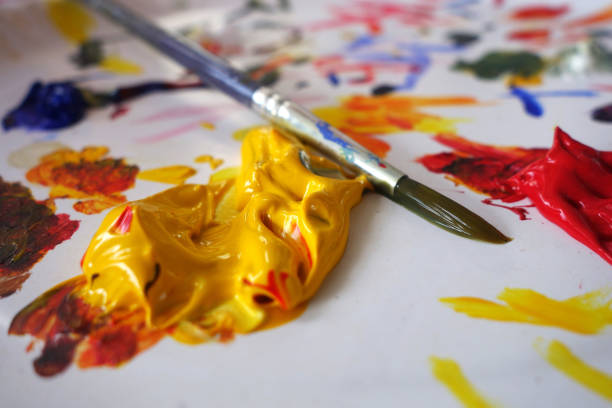 Artist brush and paint scratch. Close up