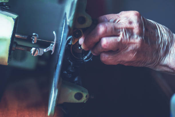 istock Close up of sewing machine maintenance. 1011242162