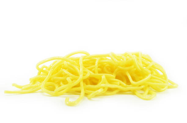 istock Yellow noodles isolated 1011242678