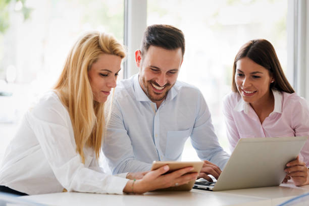 istock Business colleagues laughing 1011245082