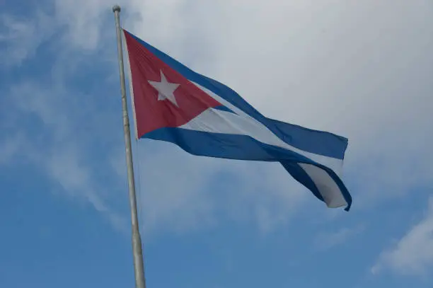 The Cuban flag blowing in the wind in Revolutionary Square in Havana a few weeks before Pope Benedict's visit in 2012.