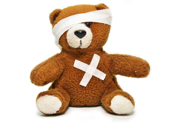 istock Injured teddy bear with bandages 1011249830