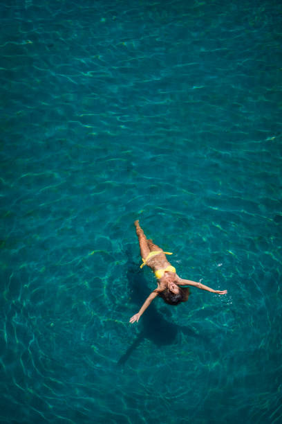 istock Swiming girl 1011250848