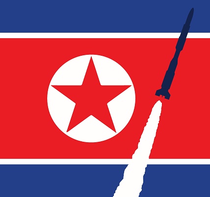 North Korean flag with launched missle