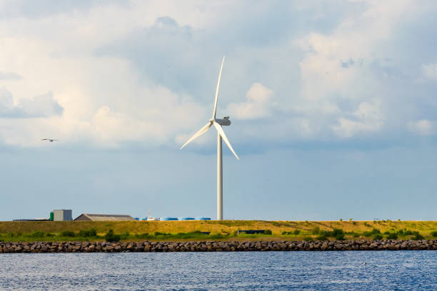istock Wind turbines, a sunny summer day. Blue sky. Ecological energy. Denmark. 1011254920