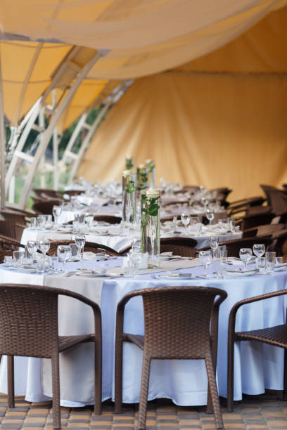 empty wine glasses restaurant interior serving, beautifully served wine glasses - banquet table set restaurant imagens e fotografias de stock