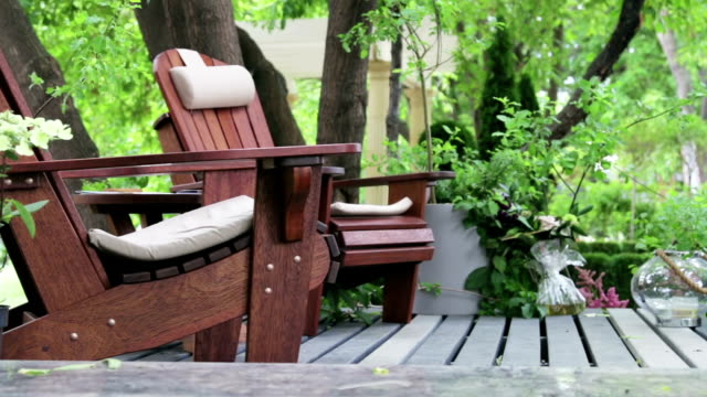 garden wooden furniture on the terrace of the house