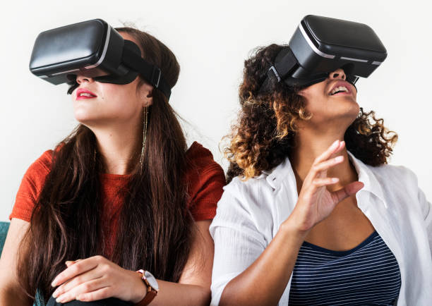 istock Women experiencing the virtual reality goggles 1011284770