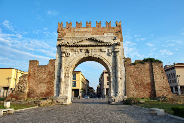 Famous place in Rimini, Italy. Arch of Augustus, the ancient gate of the city. Travel to Europe augustus caesar stock pictures, royalty-free photos & images