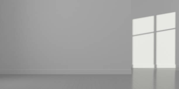 istock Stimulate image of empty white room and wood plank floor with sun light cast window shadow on the wall,Perspective of minimal design architecture.3d render. 1011293416